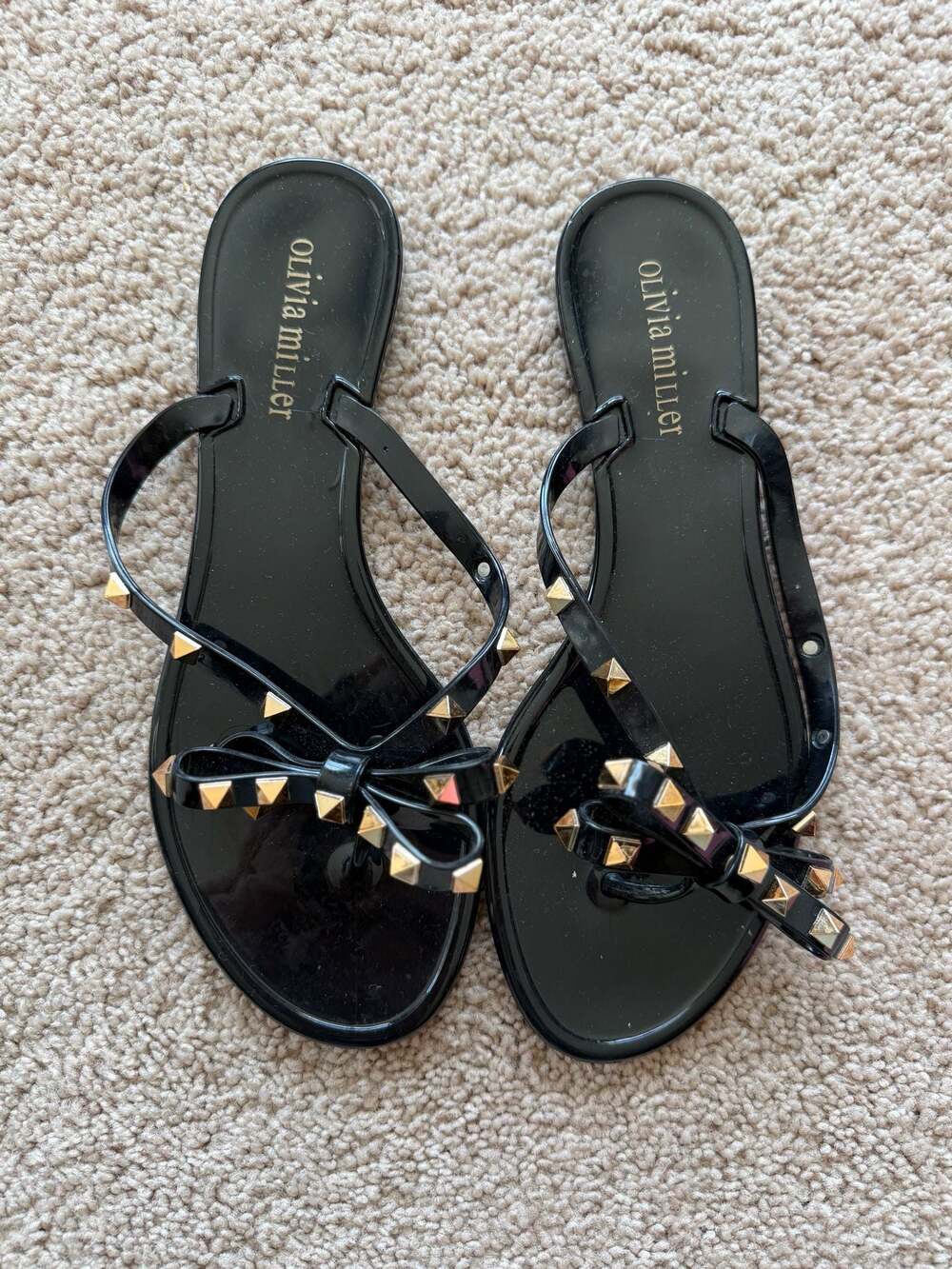 Olivia Miller Women's Black Studded Jelly Flip Flop Sandals with Bow
